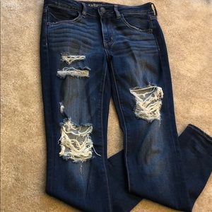 Distressed super stretch high waisted skinny jeans